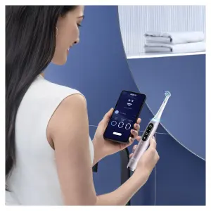 Oral B EK iO Series 9 Rose Quartz  + držiak zubnej kefky + cestovné púzdro